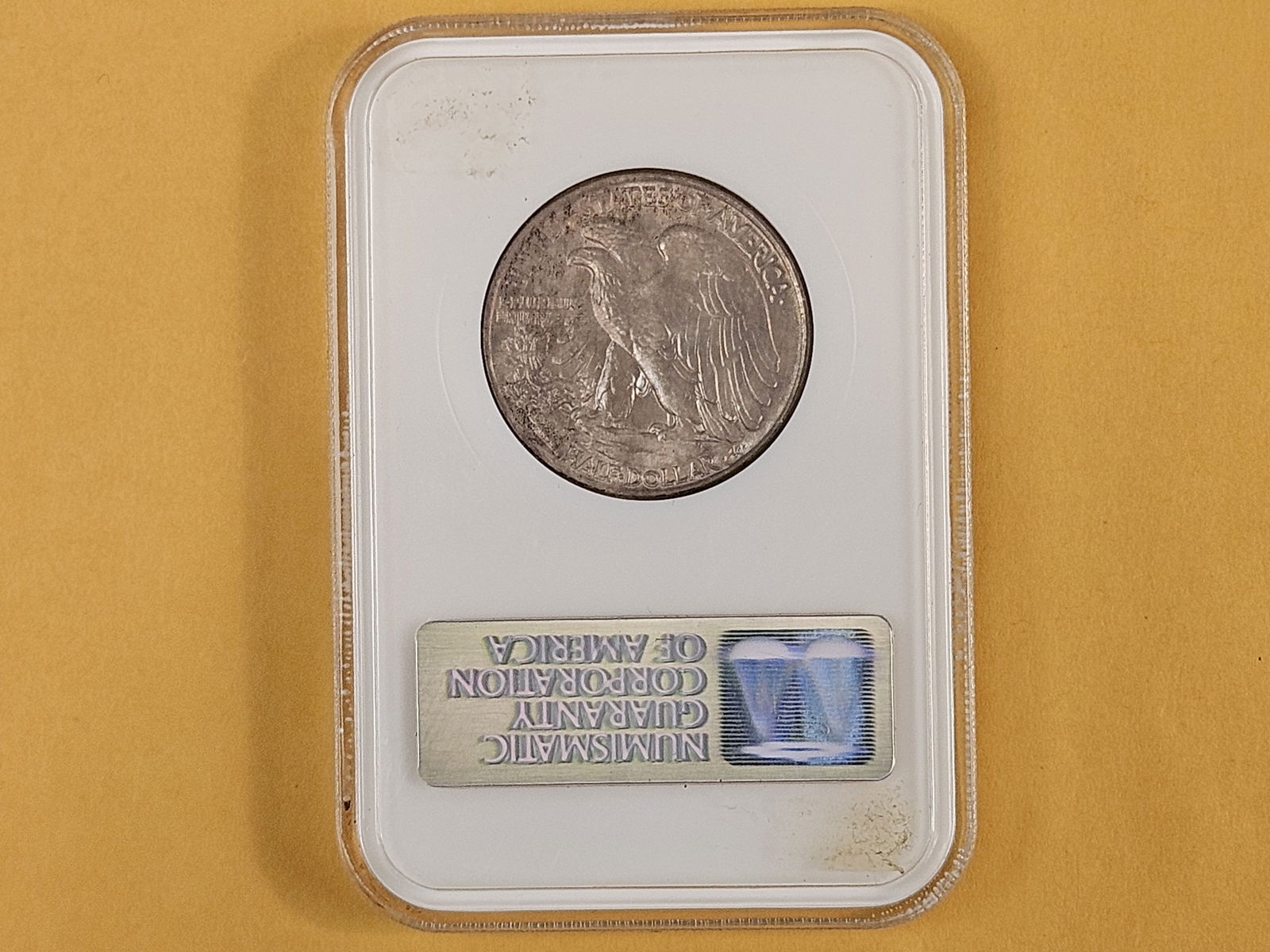 NGC 1945 Walking Liberty half Dollar in Mint State 64 - 8