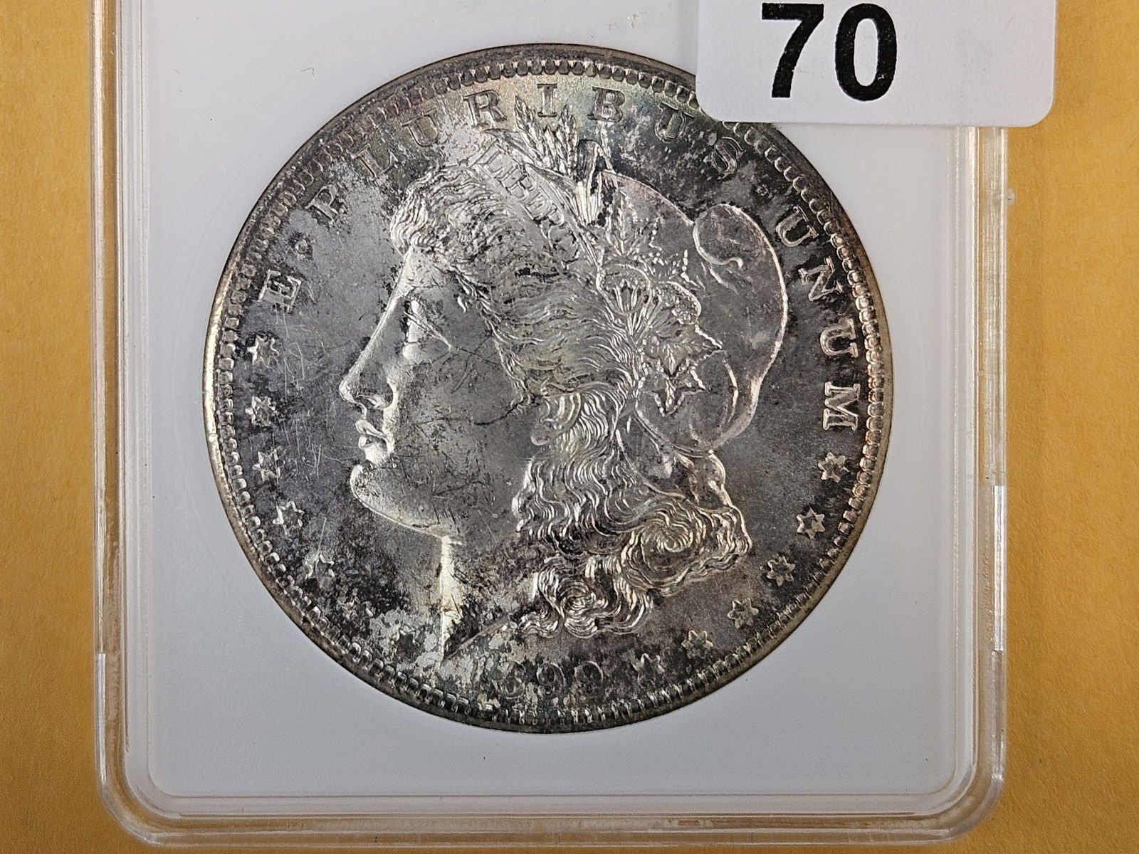 ANACS 1899-O Morgan Dollar in Mint State 63: Interesting toning 