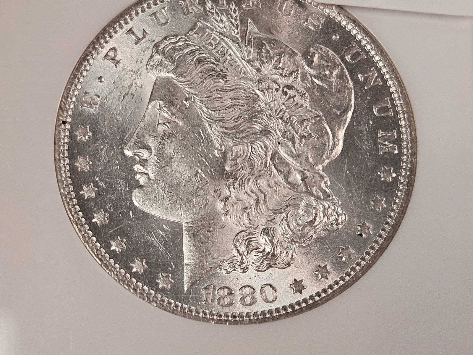 NGC 1880-O Morgan Dollar in Mint State 61 - 3