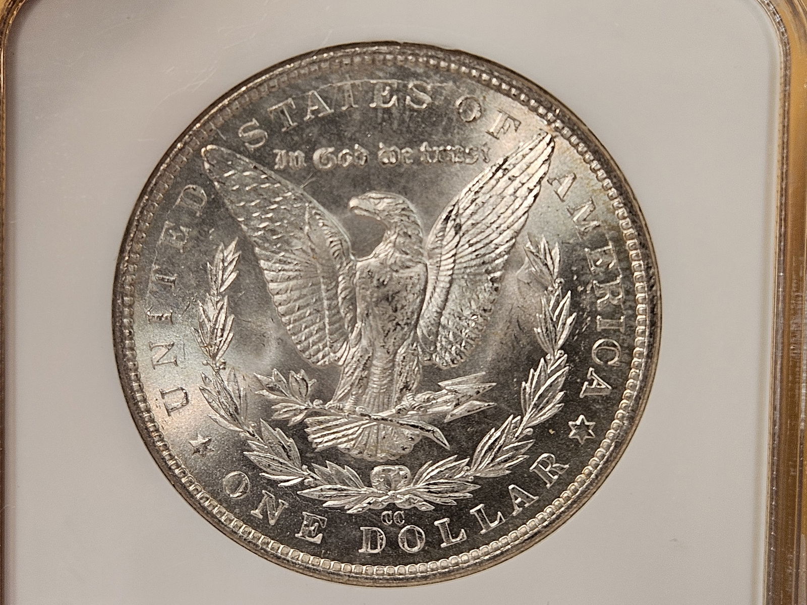 ** KEY DATE ** NGC 1883-CC Morgan Dollar in Mint State 64 - 10