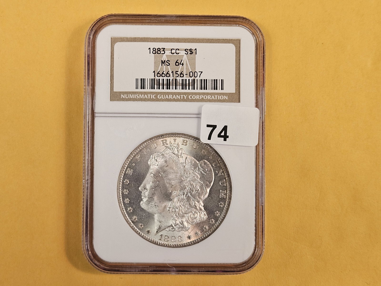 ** KEY DATE ** NGC 1883-CC Morgan Dollar in Mint State 64 - 2