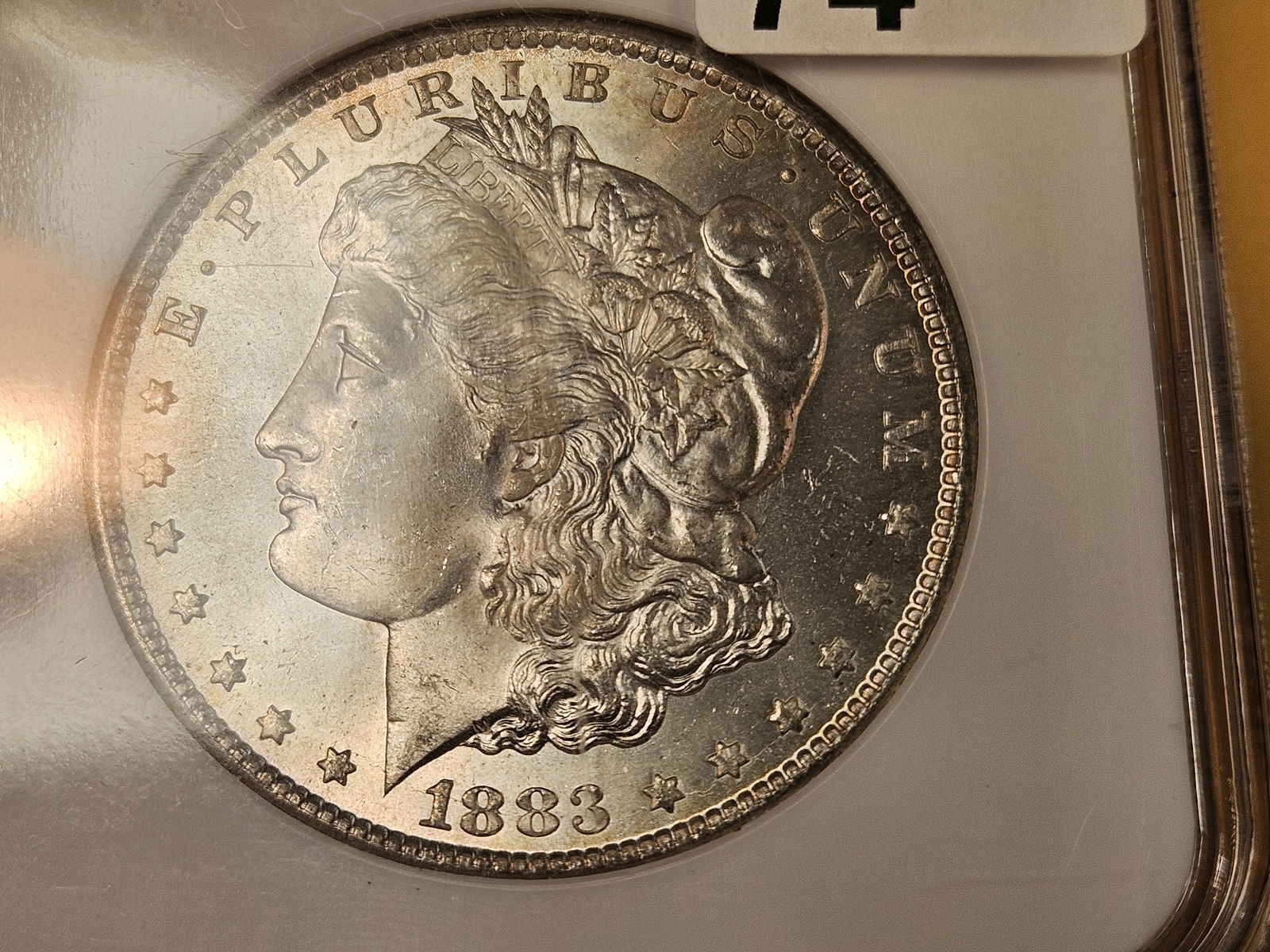 ** KEY DATE ** NGC 1883-CC Morgan Dollar in Mint State 64 - 4