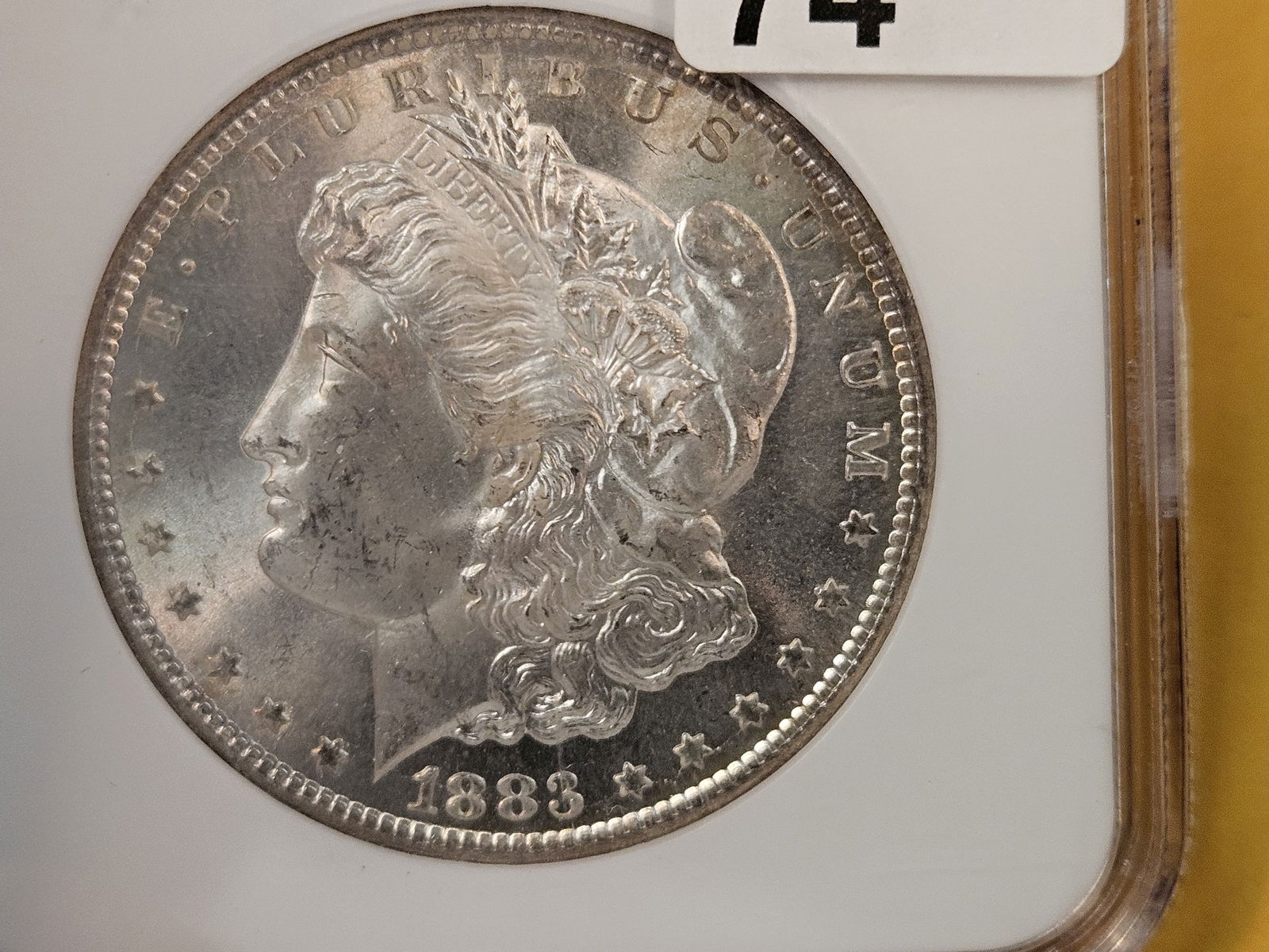 ** KEY DATE ** NGC 1883-CC Morgan Dollar in Mint State 64 - 6