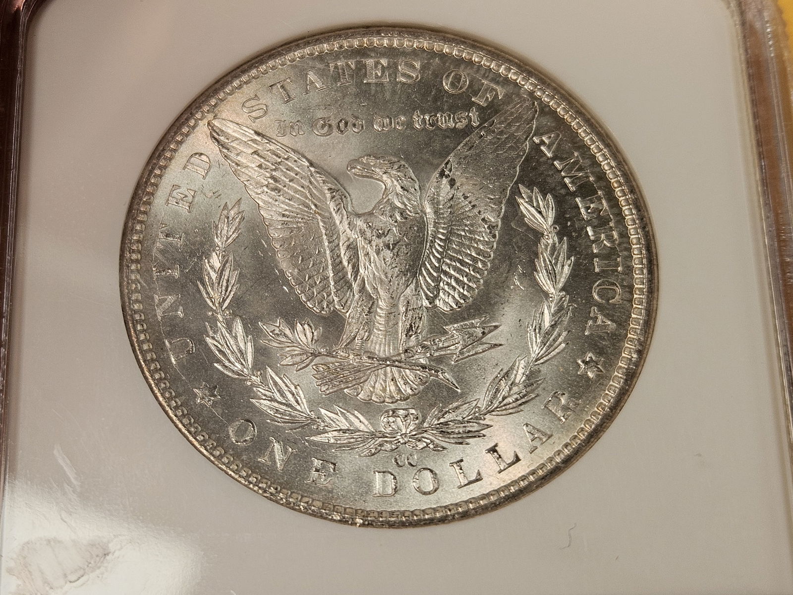 ** KEY DATE ** NGC 1883-CC Morgan Dollar in Mint State 64 - 8