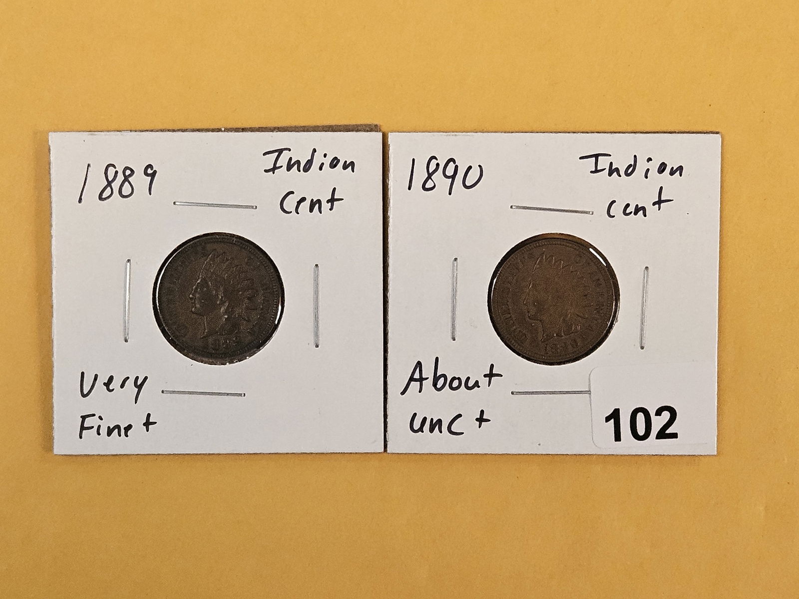 1889 and 1900 Indian cents: In Very Fine plus and About Uncirculated plus 