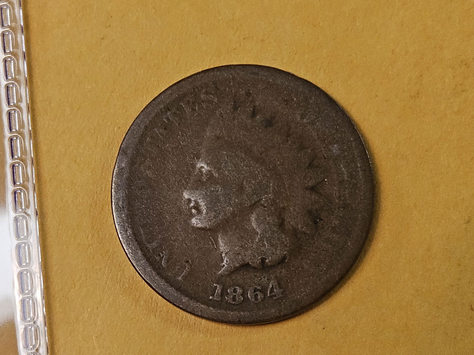 Semi-Key 1864-L Indian Cent: Circulated. Has a 180 Degree rotated reverse 