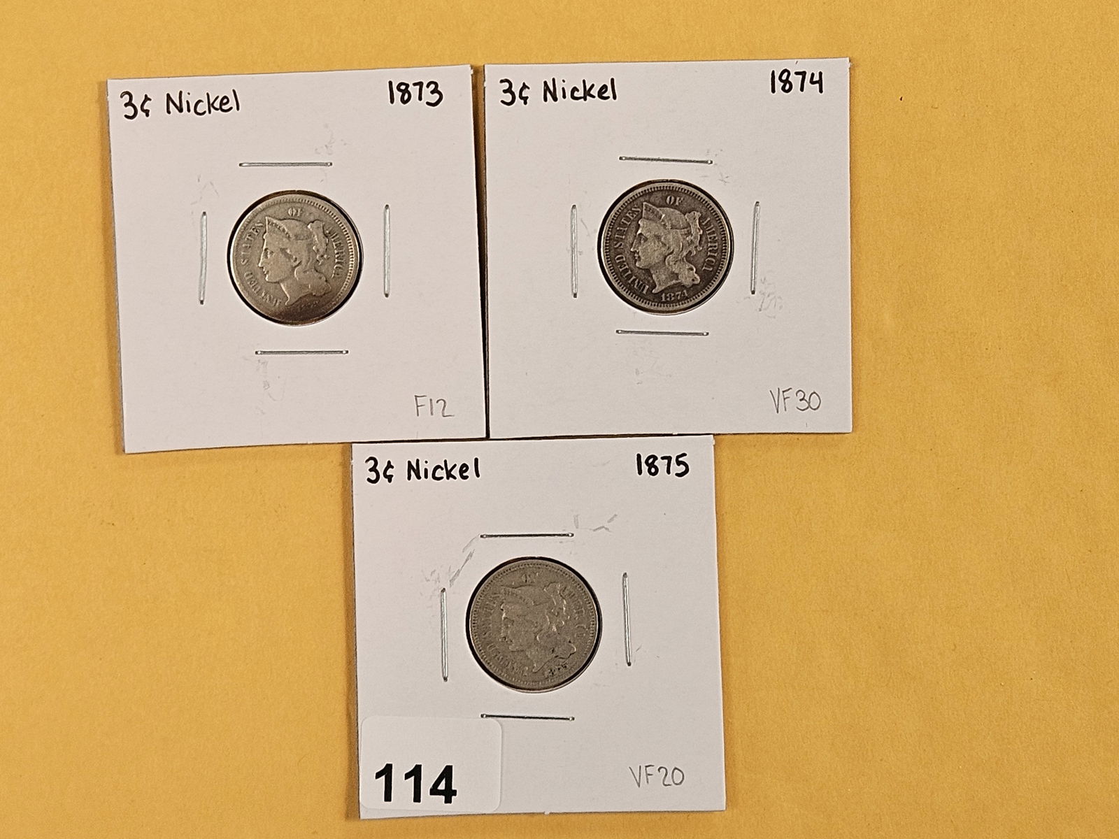 Three 3-cent Nickels in Very Good to Fine plus: 1873, 1874 and 1875 