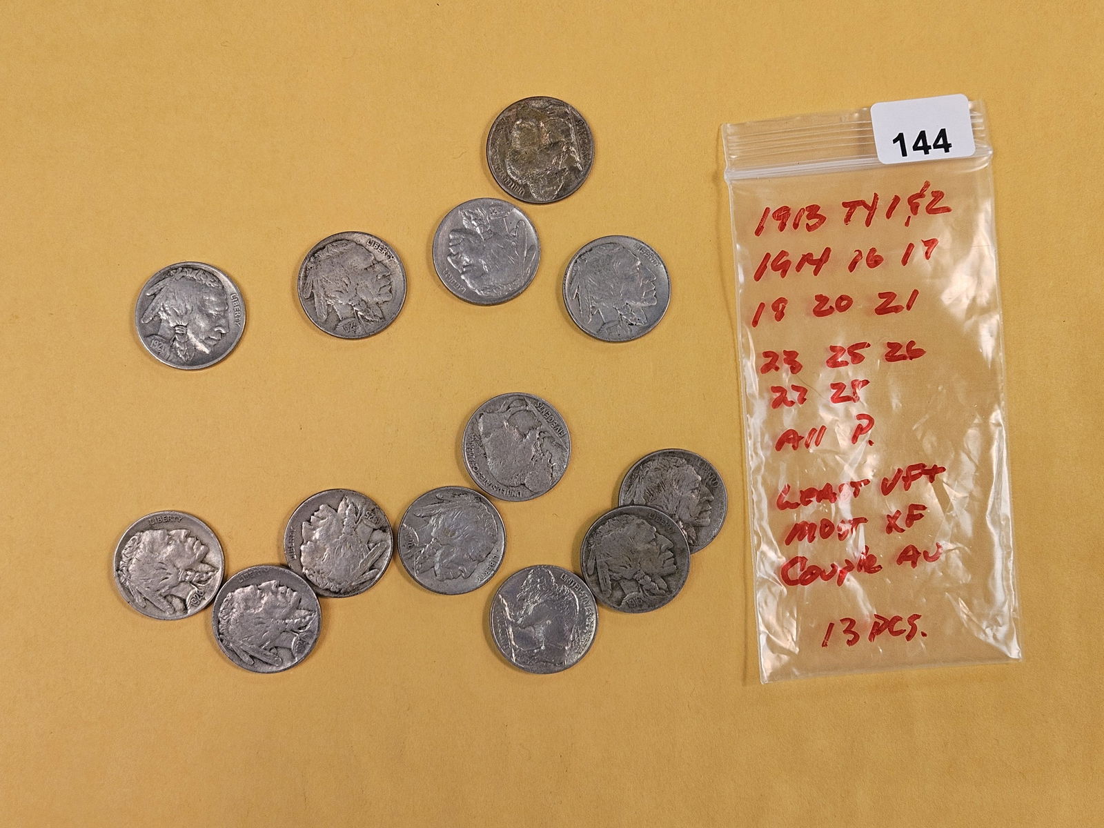 Thirteen Buffalo Nickels in Very Fine plus to About Uncirculated: Better and earlier dates 