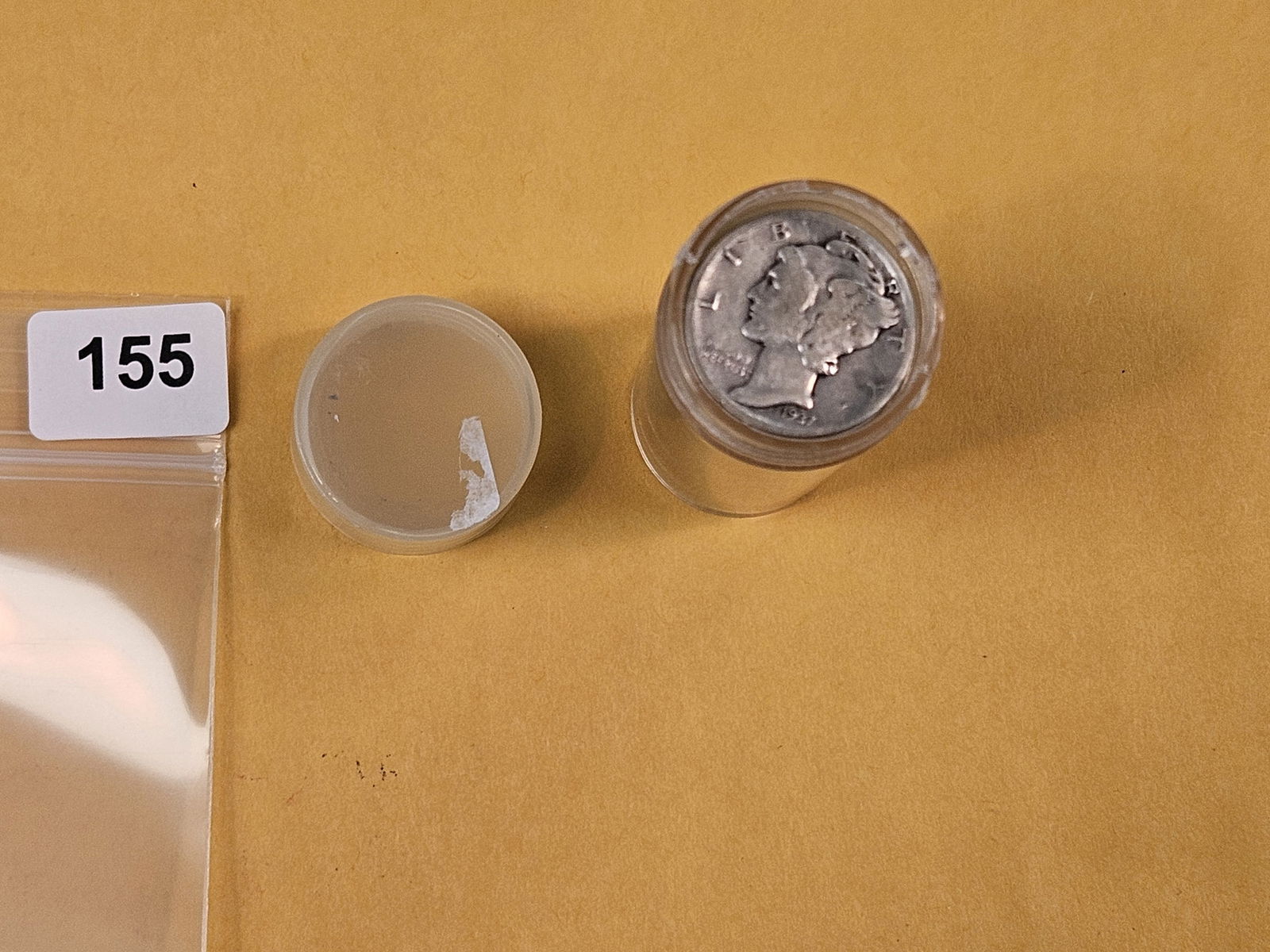 Full roll of silver Dimes: I think they're all Mercury. Probably all well circulated. Unchecked by us 