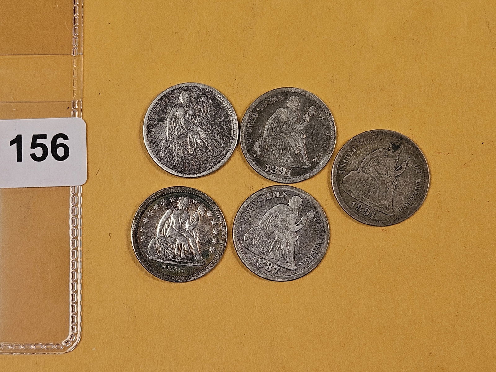 Five mixed silver Seated Liberty Dimes: Circulated 