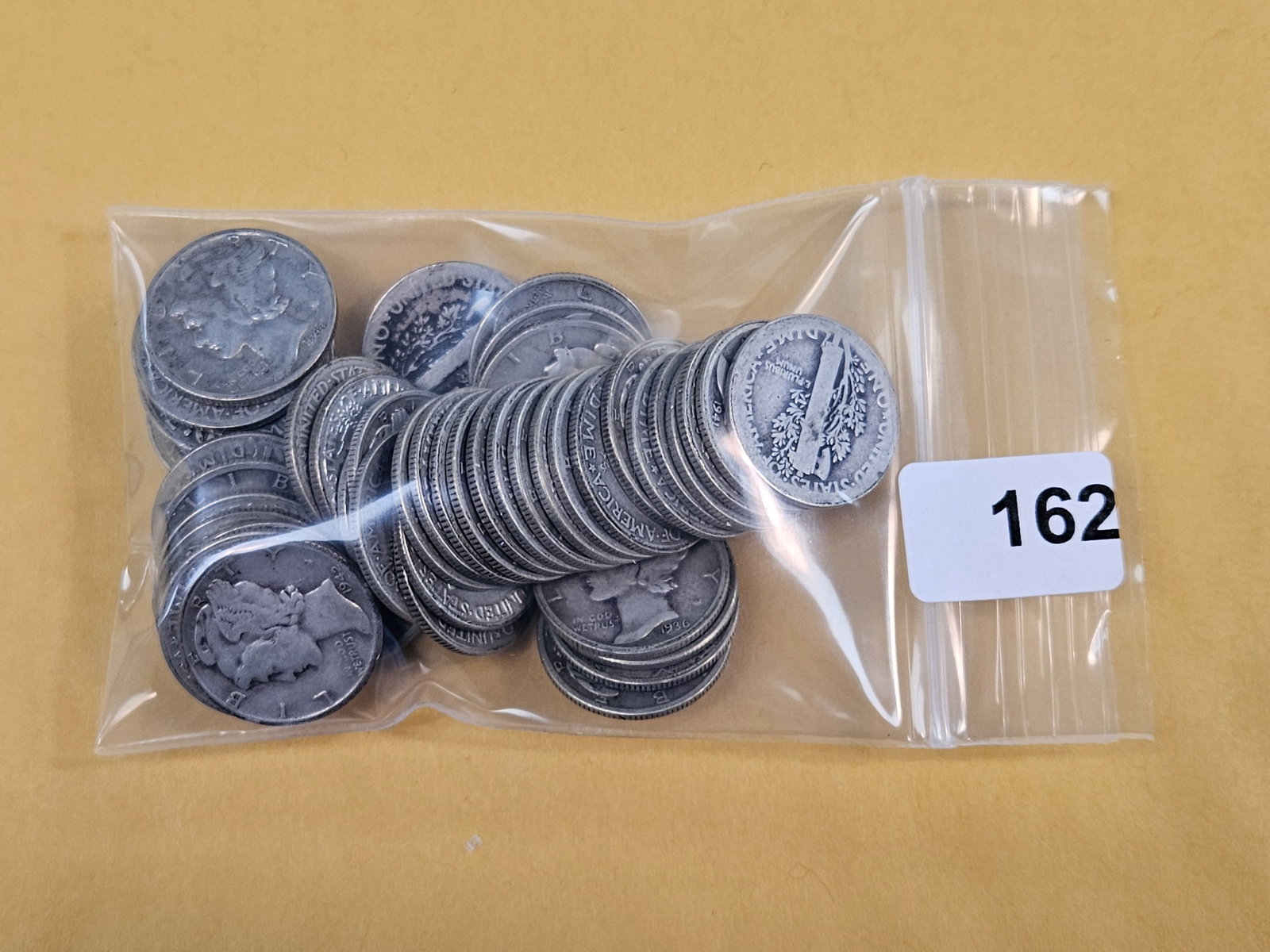Fifty mixed silver Mercury Dimes: Circulated 