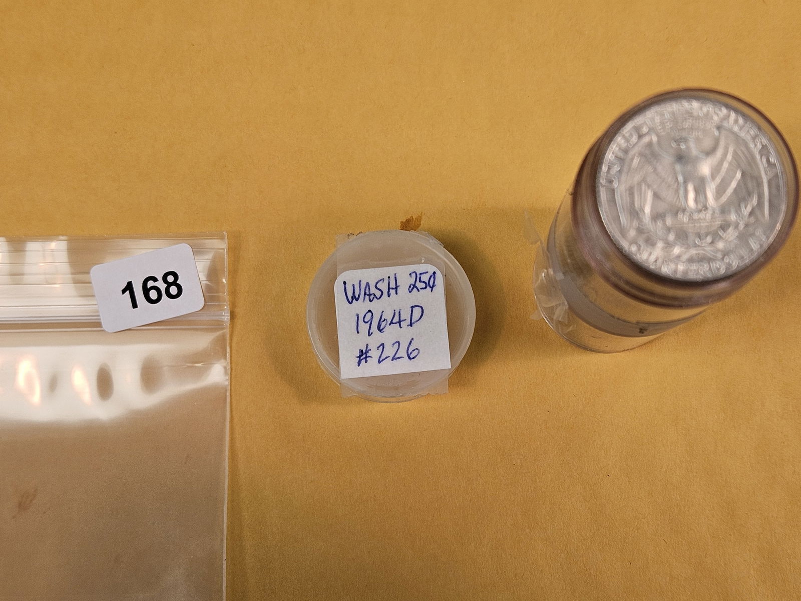 Full Roll of silver Washington Quarters: From Consignor. Unchecked by us. Top says 1964-D. probably all circulated