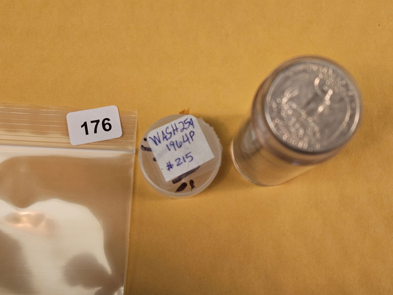 Full Roll of silver Washington Quarters: From Consignor. Unchecked by us. Top says 1964. Probably all circulated 