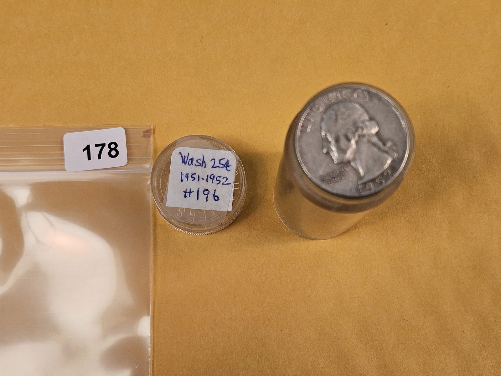 Full Roll of silver Washington Quarters: From Consignor. Unchecked by us. Top says 1951 - 52. Probably all circulated 