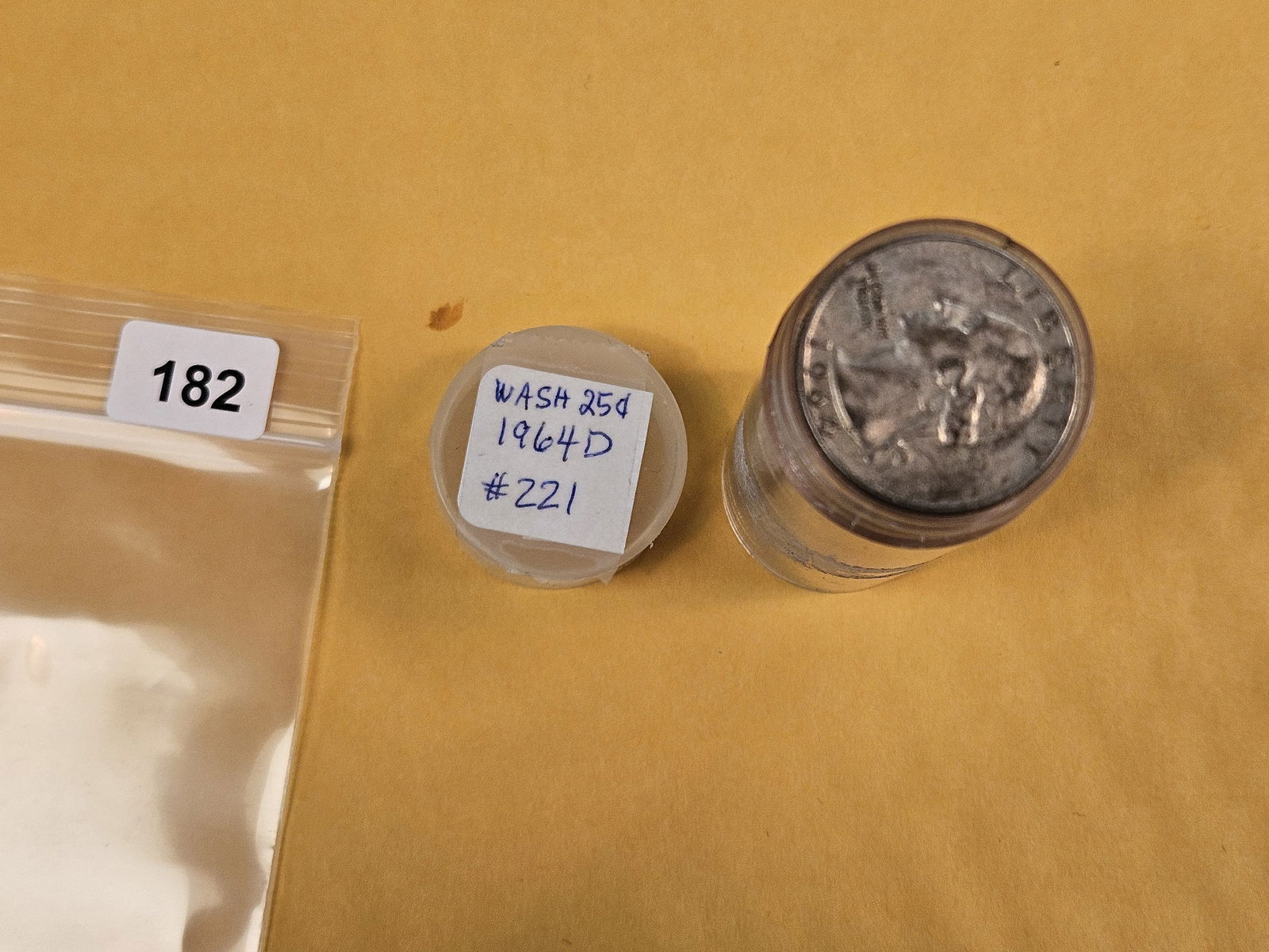 Full Roll of silver Washington Quarters: From Consignor. Unchecked by us. Top says 1964-D. Probably all circulated 