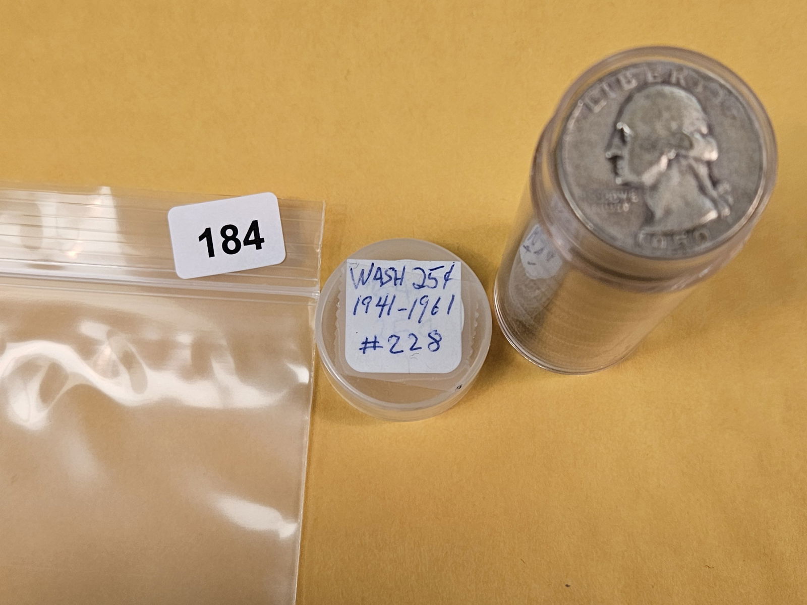 Full Roll of silver Washington Quarters: From Consignor. Unchecked by us. Top says 1941 - 61. Probably all circulated