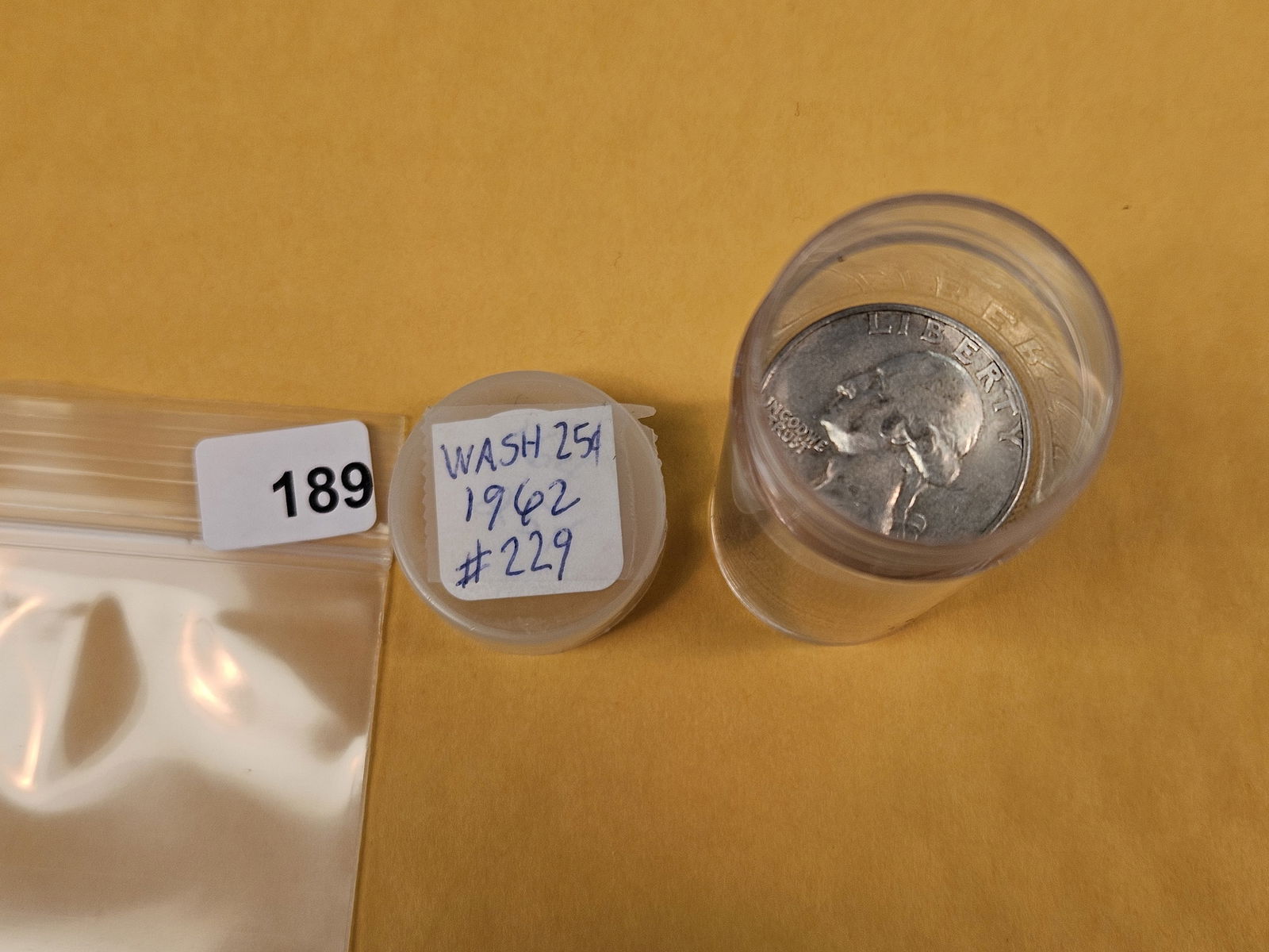 Twenty-five silver Washington Quarters: From Consignor. Unchecked by us. Top says 1962. Probably all circulated