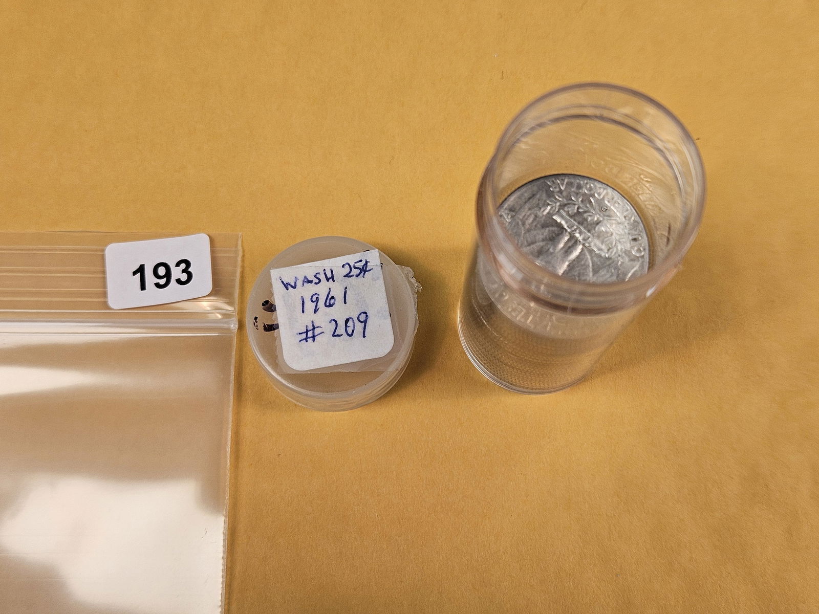 Twenty-Two Silver Washington Quarters: From Consignor. Unchecked by us. Top says 1961. Probably all circulated