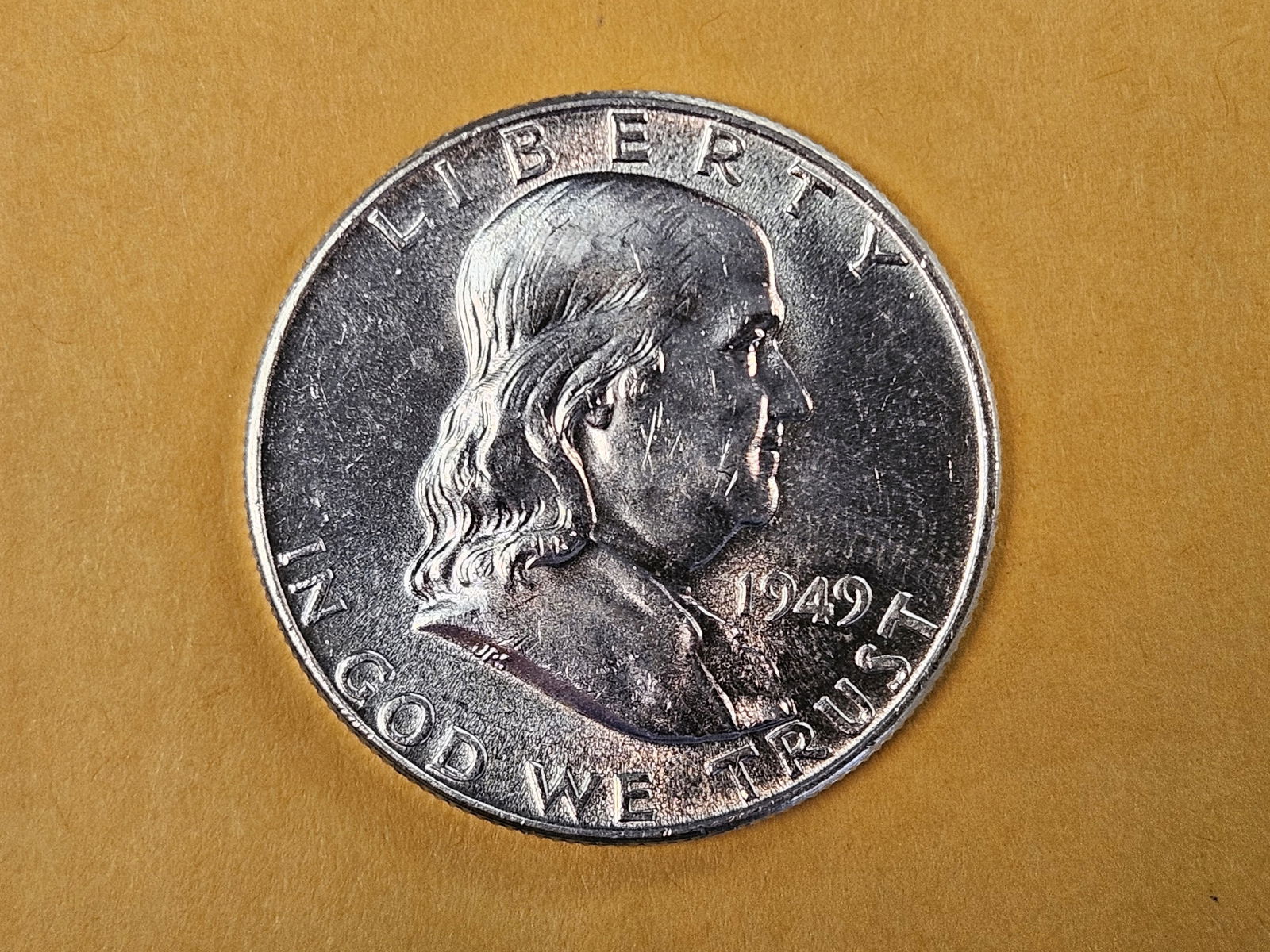 Choice Brilliant Uncirculated 1949 Franklin silver half dollar FBL: Full Bell Lines 