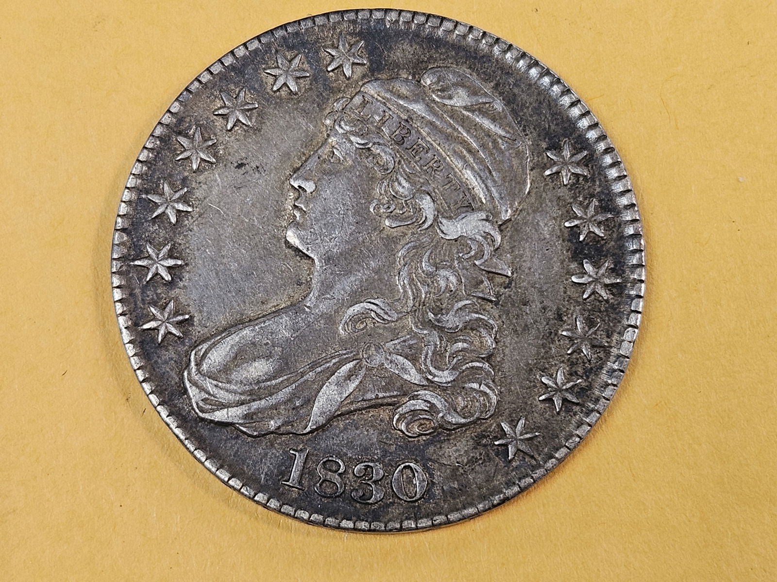 1830 Capped Bust Half Dollar in About Uncirculated plus: Lovely eye appeal. Good patina 