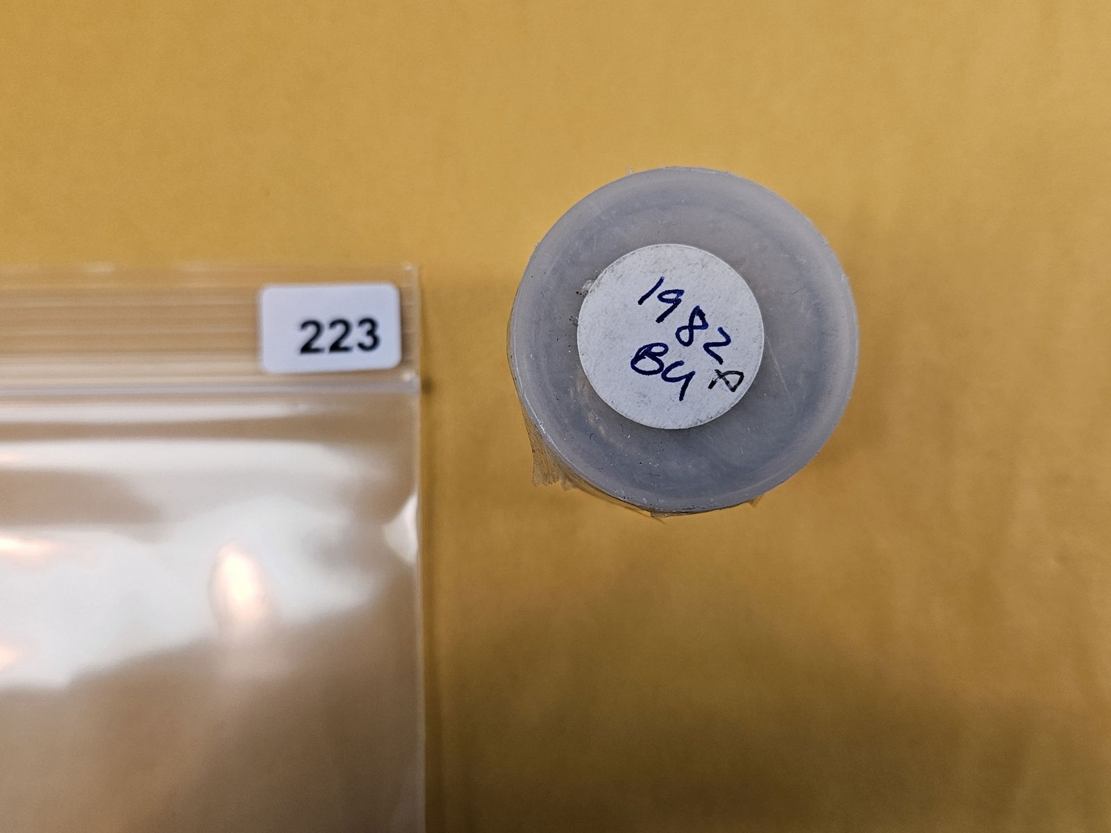 Key Date Roll of 1982 Kennedy Half Dollars: Top is taped shut. From an old collection. We didn’t open or search 