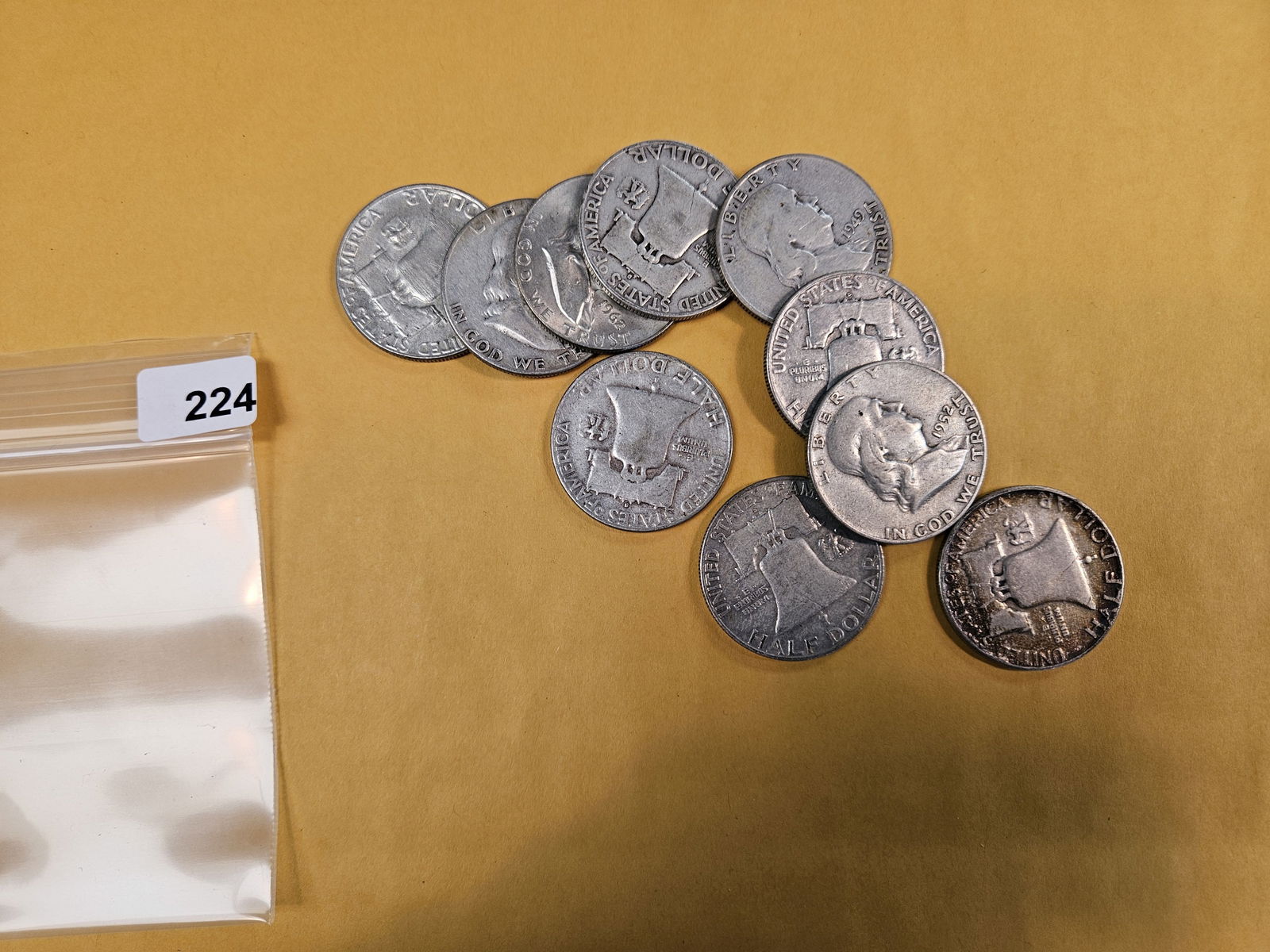 Ten mixed silver Franklin half dollars: Circulated 