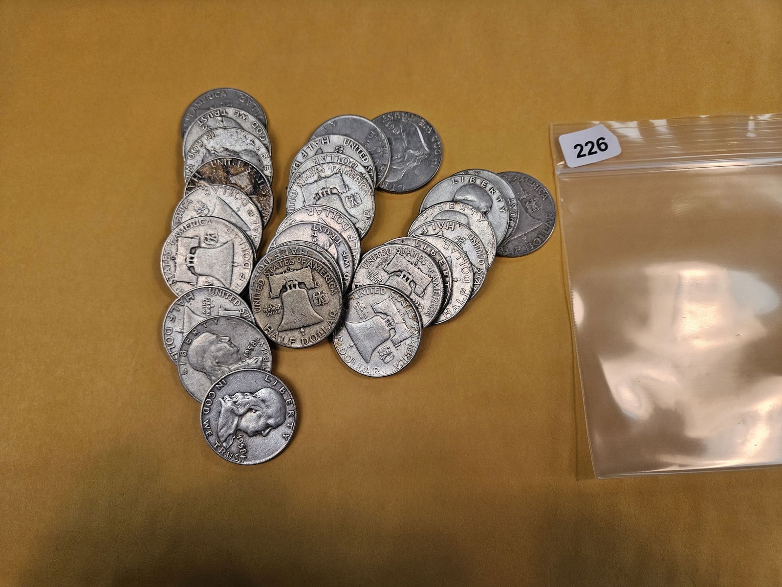 Thirty mixed silver Franklin Half Dollars: Circulated 