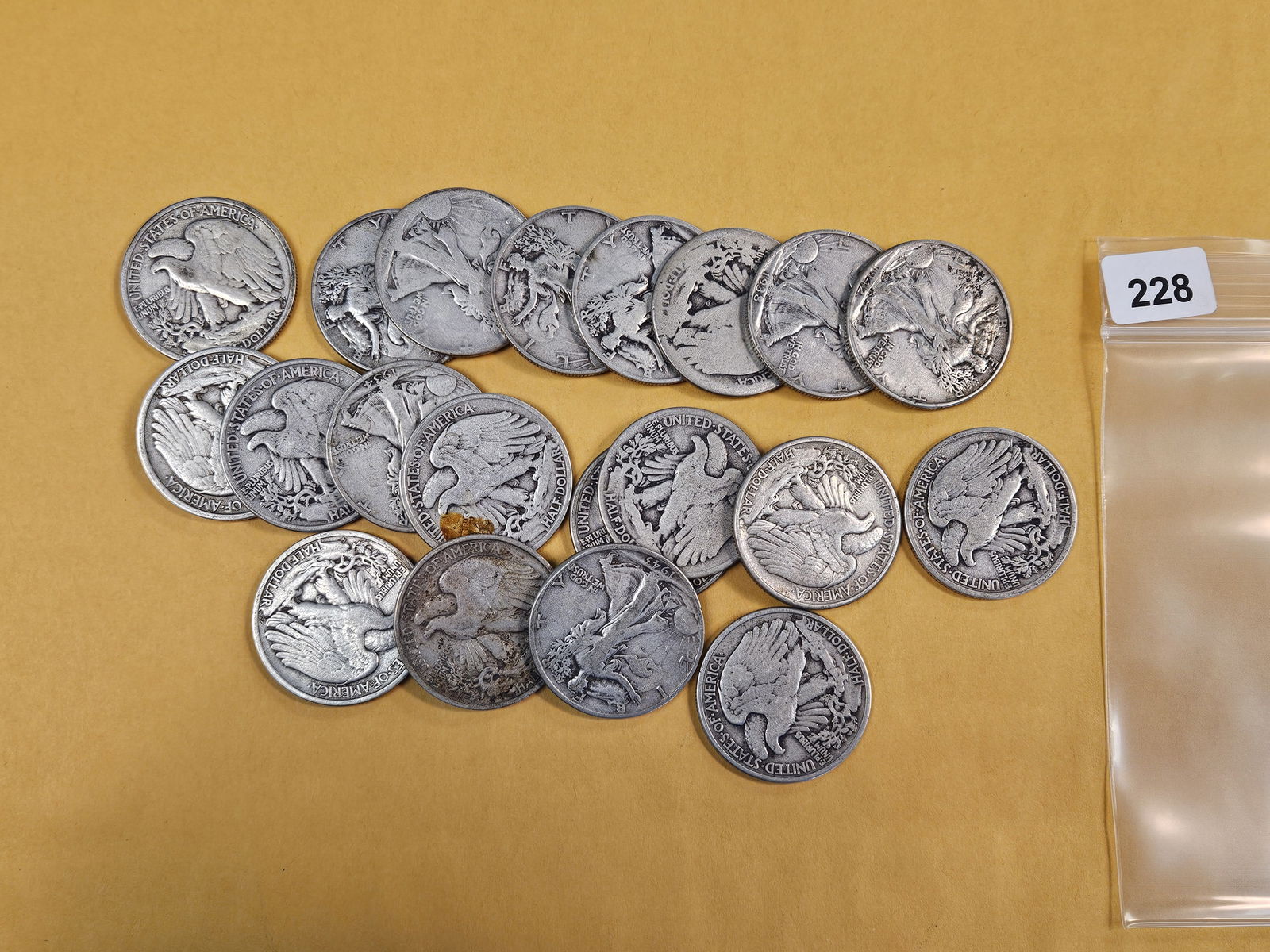 Twenty mixed silver Walking Liberty half dollars: Circulated 