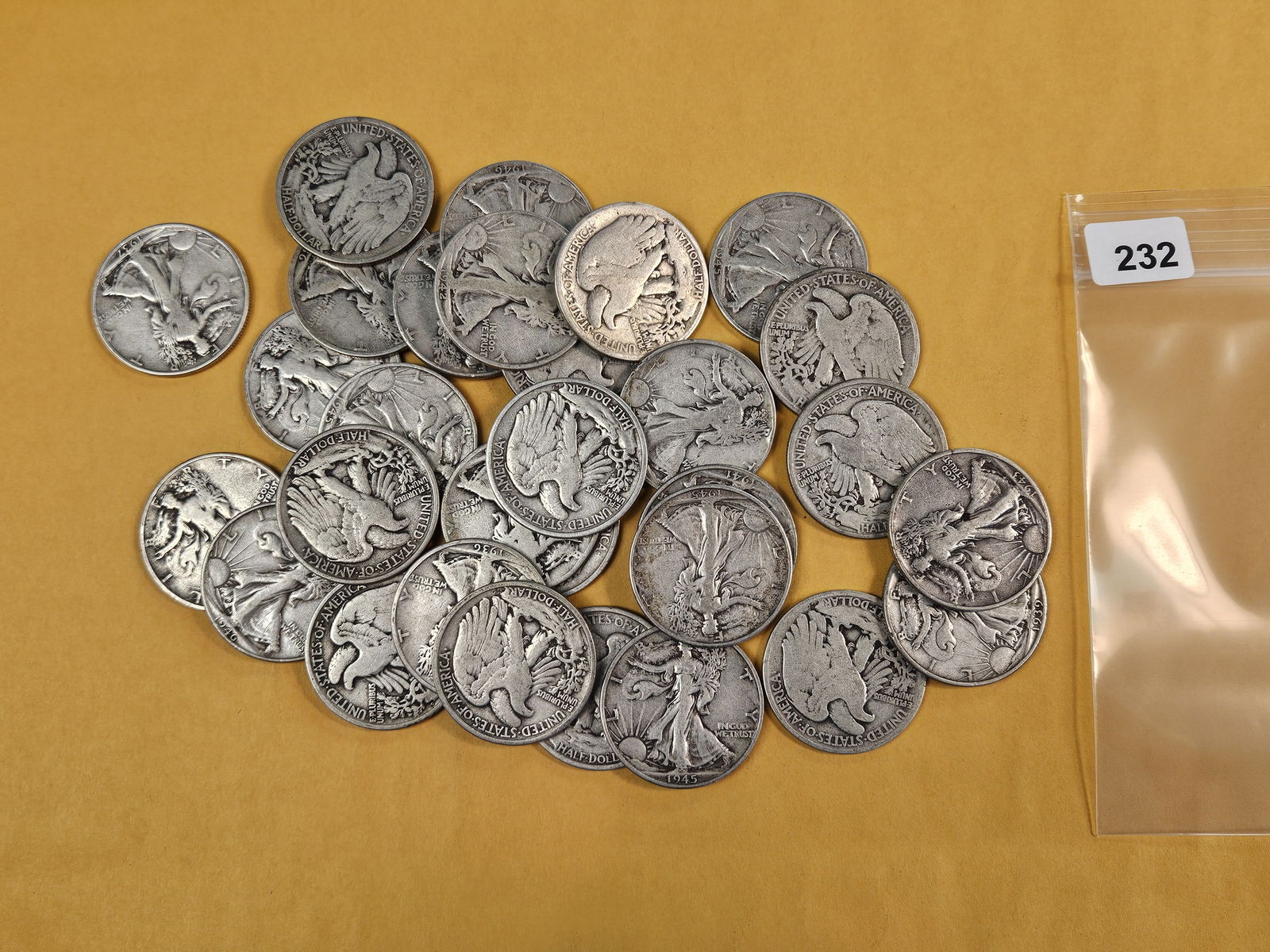 Thirty mixed silver Walking Liberty half dollars: Circulated 