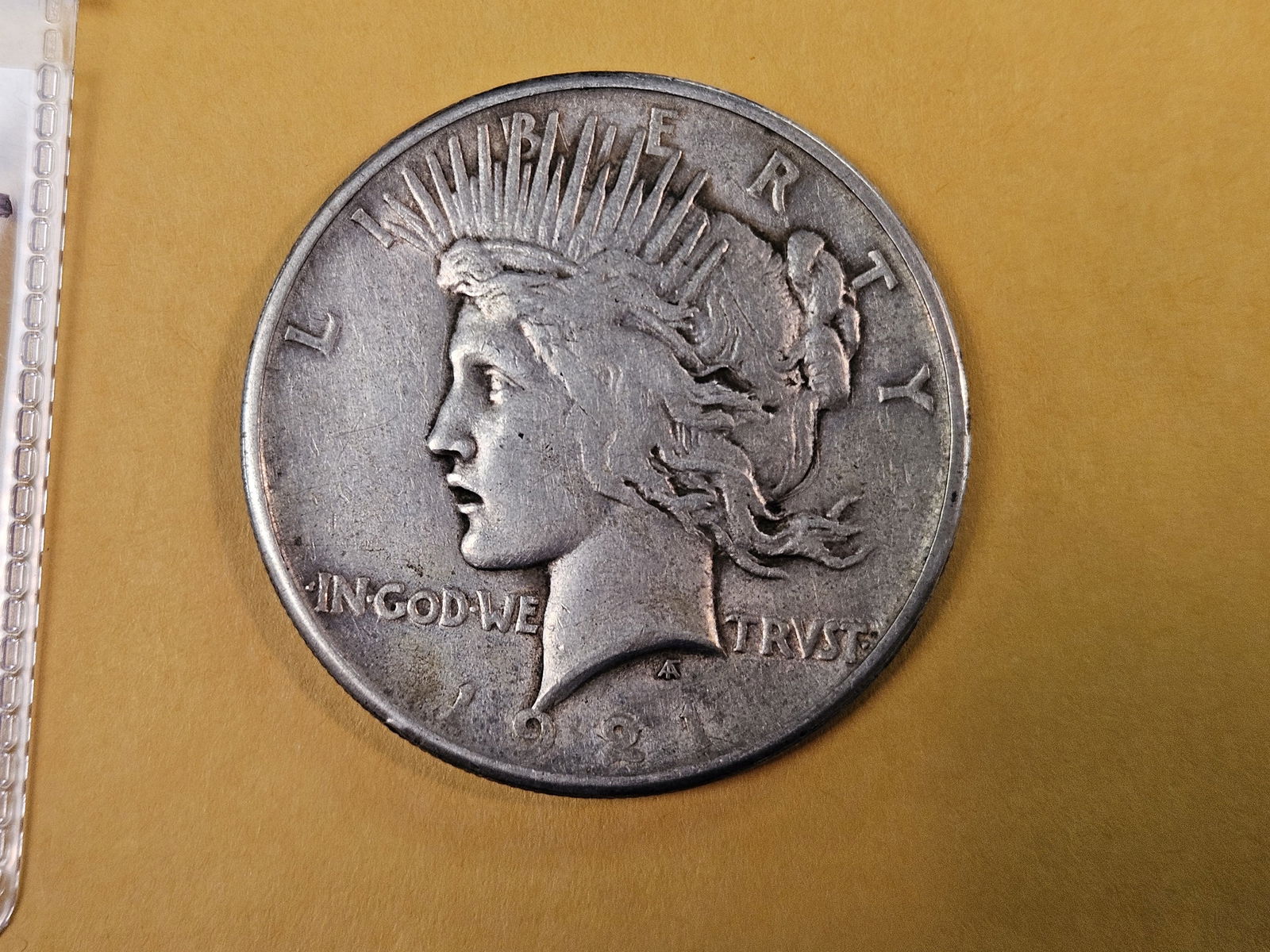 ** KEY DATE ** 1921 Peace silver dollar in About Uncirculated: High Relief. First Year Issue 