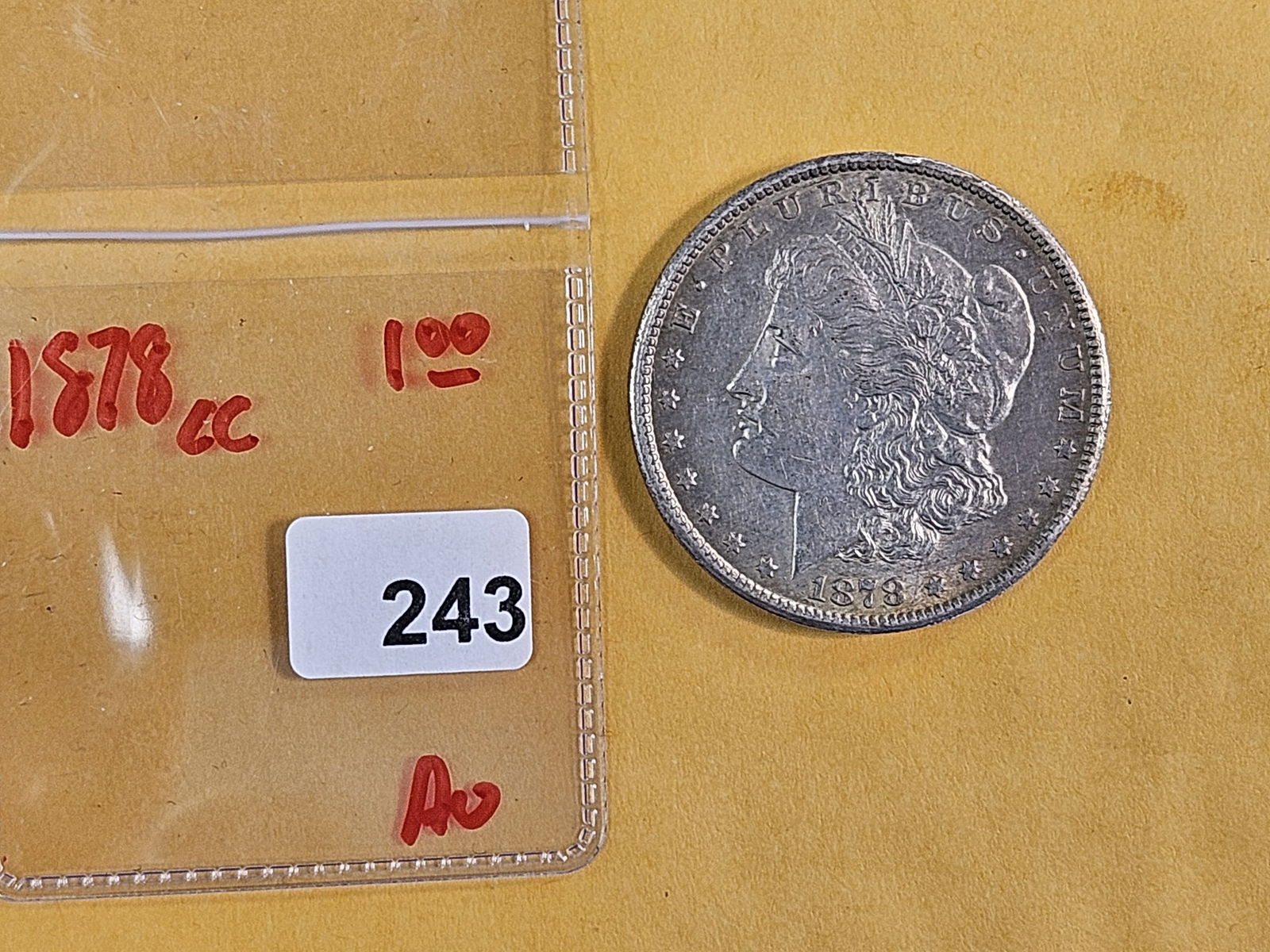 ** KEY DATE ** 1878-CC Morgan Dollar in About Uncirculated - 2