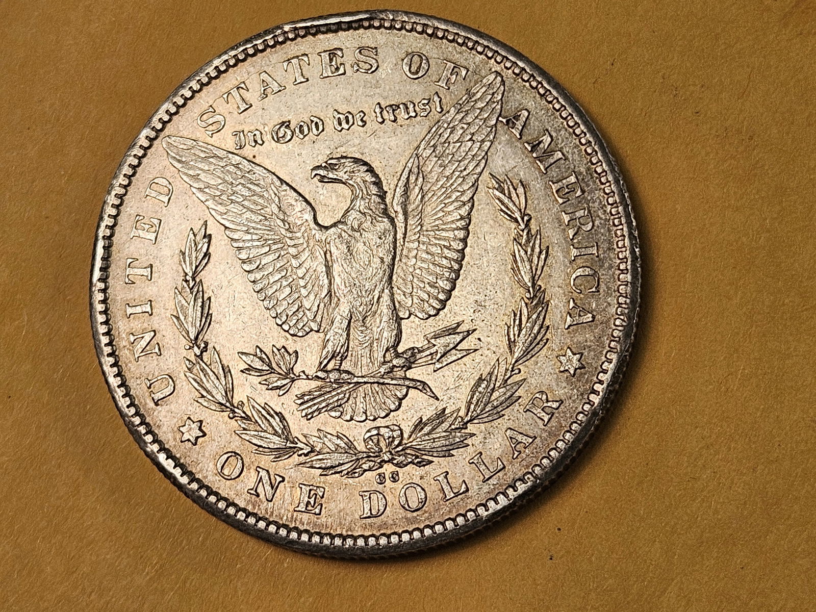 ** KEY DATE ** 1878-CC Morgan Dollar in About Uncirculated - 5