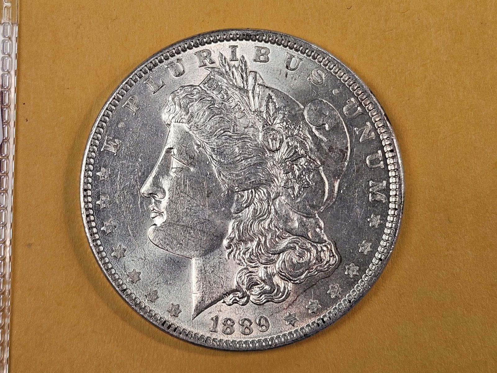 Choice Brilliant Uncirculated 1889 Morgan silver Dollar: Bright luster