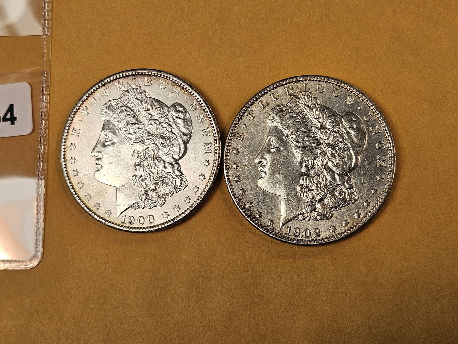 Two About Uncirculated Morgan Silver Dollars: 1900 and 1902 