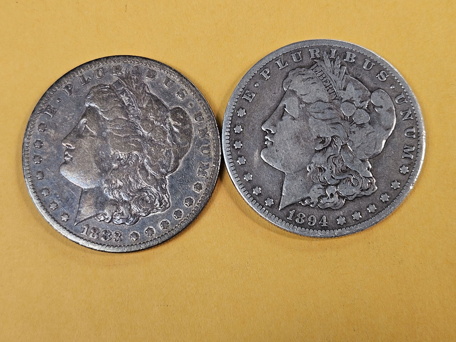 Two better date Morgan Silver Dollars: 1883-S and 1894-S 