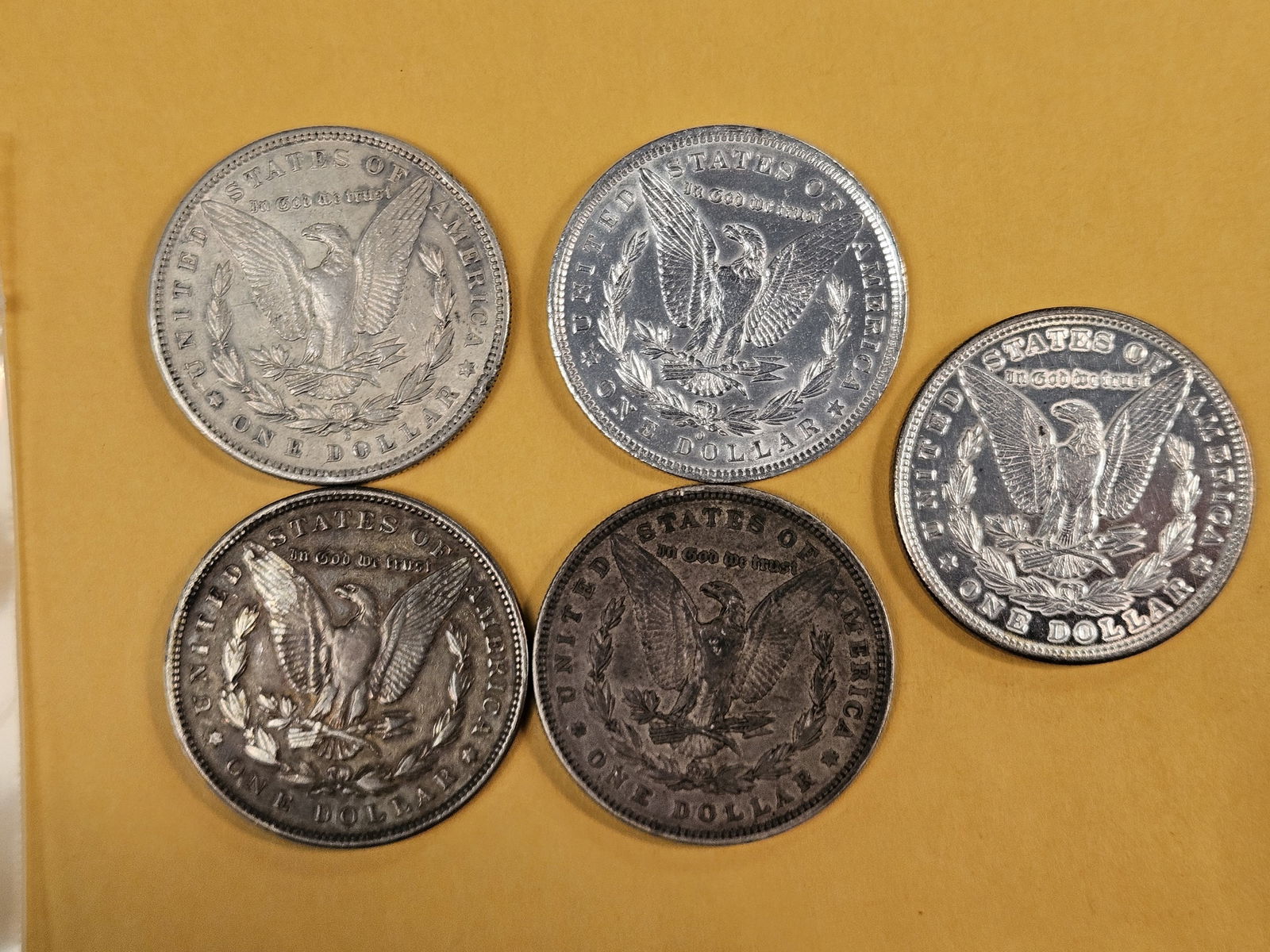 Five mixed Morgan Silver Dollars - 2