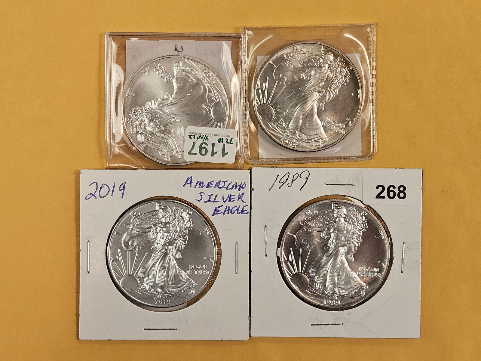 Four GEM Brilliant Uncirculated American Silver Eagles: 2004, 1988, 2019 and 1989 