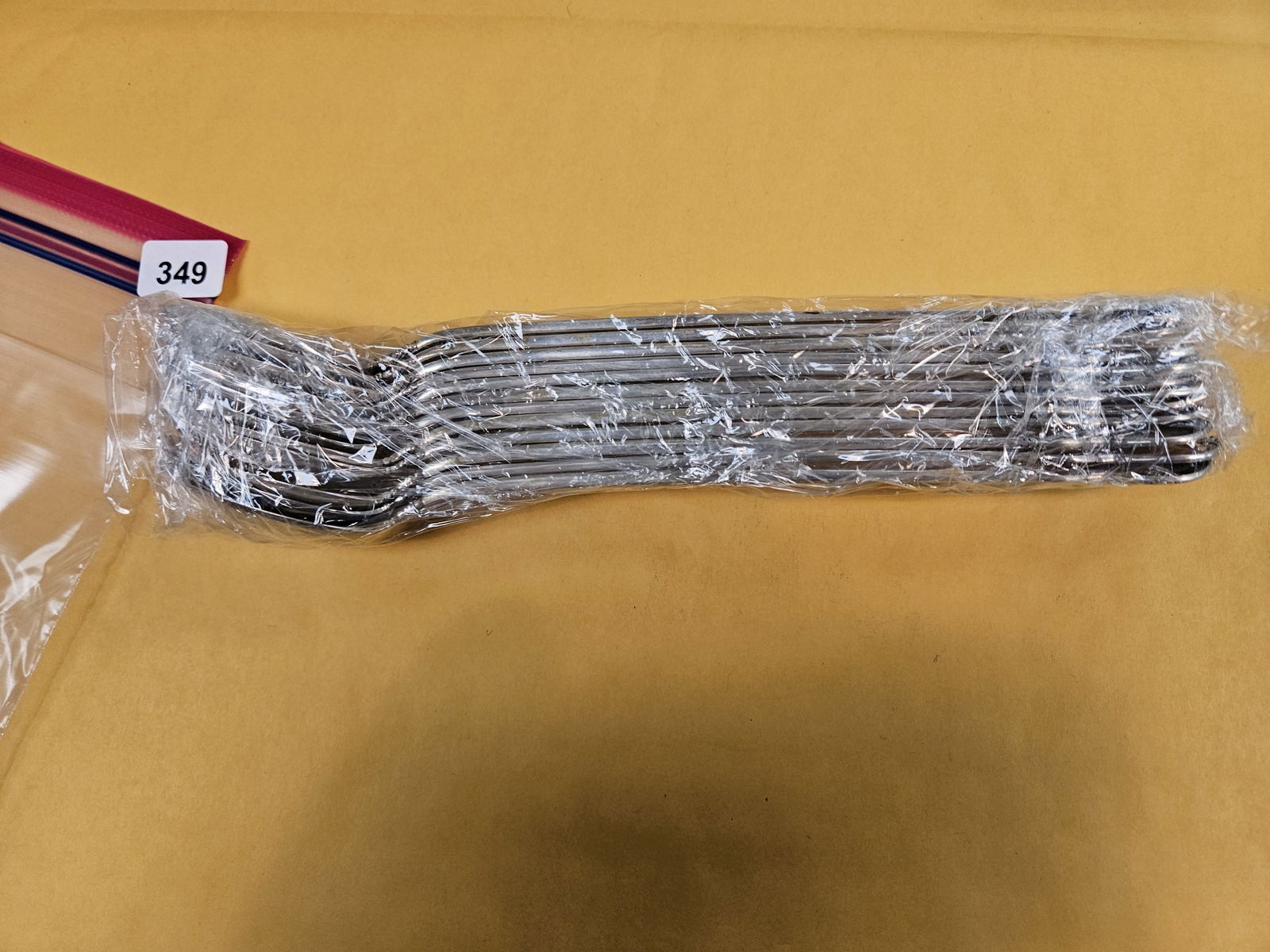 SIXTEEN Troy ounces of Sterling Silver Forks!: Twelve Sterling Silver spoons. Weighs 16.075 Troy ounces. 500 grams. These come from a nice set. They are still in their original plastic wrap! 