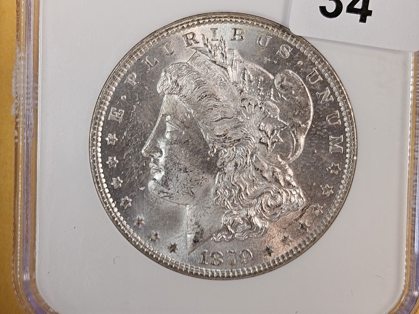 NGC 1879 Morgan Dollar in Mint State 64: Nice contrast 