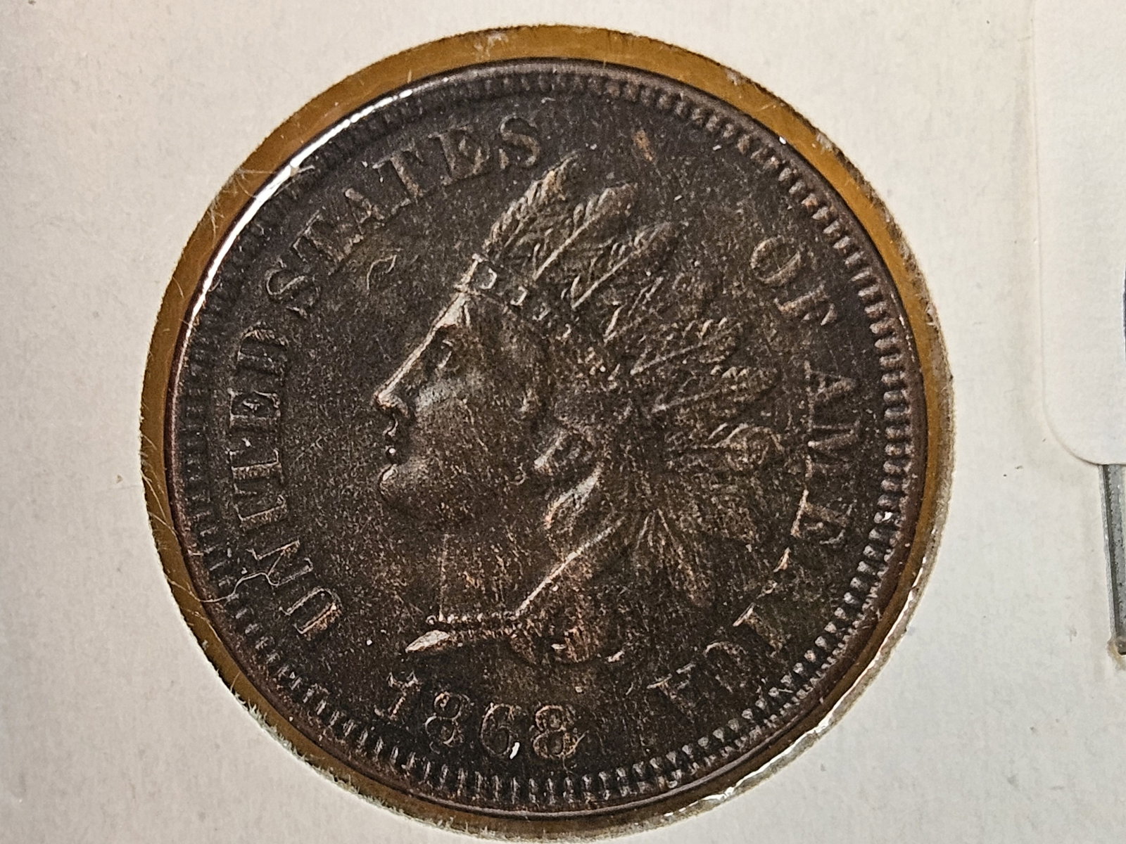 * Semi-Key 1868 Indian cent in Choice Uncirculated!: Has that tell-tale wood-grain planchet look to it. Darker toned. Good looking coin!