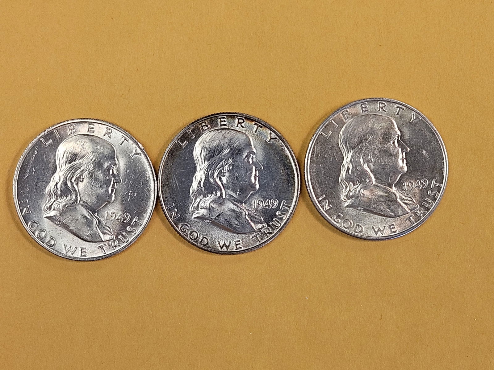 Three Brilliant Uncirculated plus Franklin Silver Half Dollars (1 of 4)