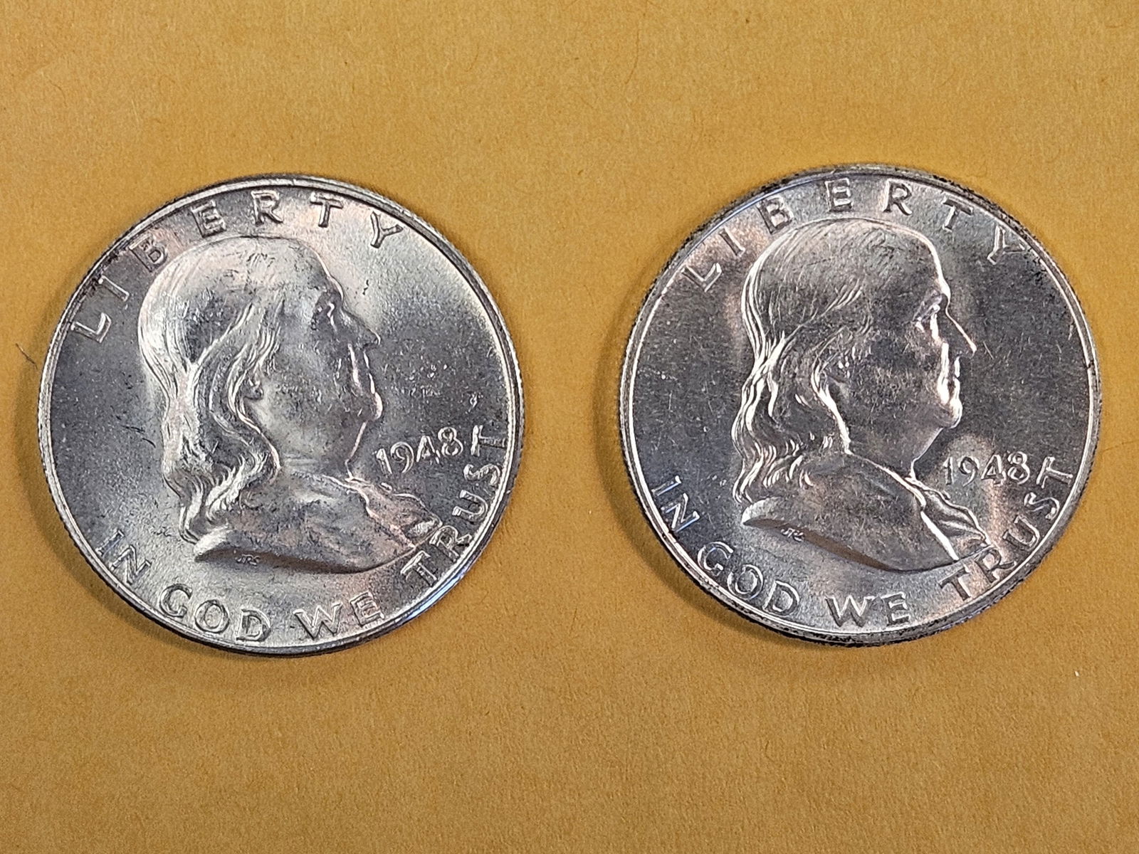 Two Choice Brilliant Uncirculated Franklin Silver Half Dollars with FBL: 1948 P and 1948-D. Both with Full Bell Lines 