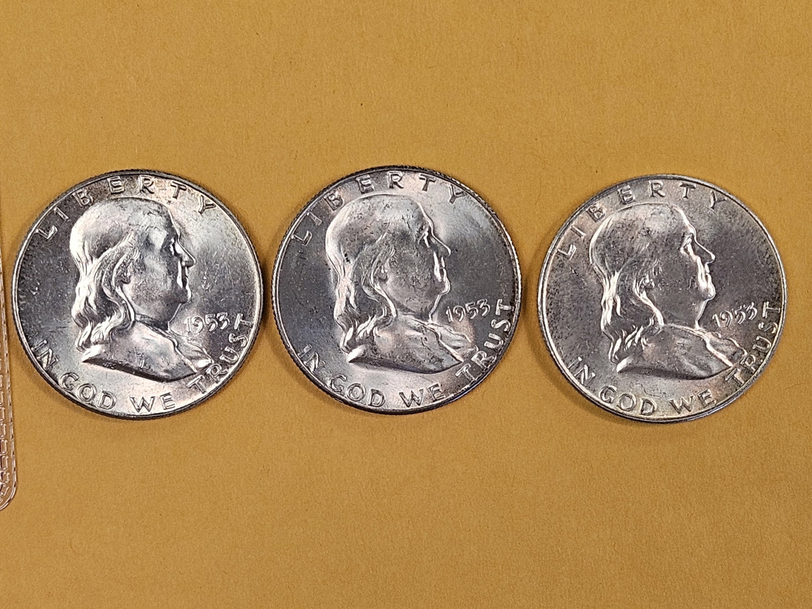 Three Choice to Very Choice Brilliant Uncirculated silver Franklin Half Dollars: 1953 P-D-S 