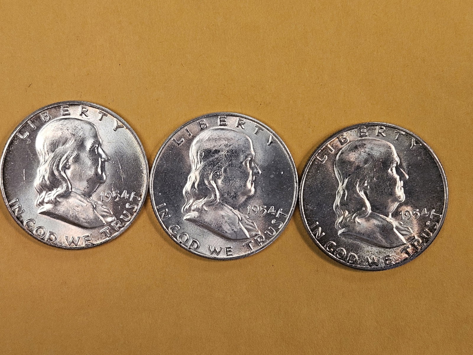 Three Choice to Very Choice Brilliant Uncirculated silver Franklin Half Dollars (1 of 5)