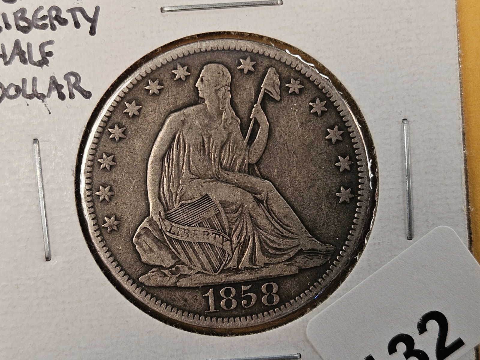 1858-O Seated Liberty Half Dollar in Very Fine: Cool clash marks on the reverse 