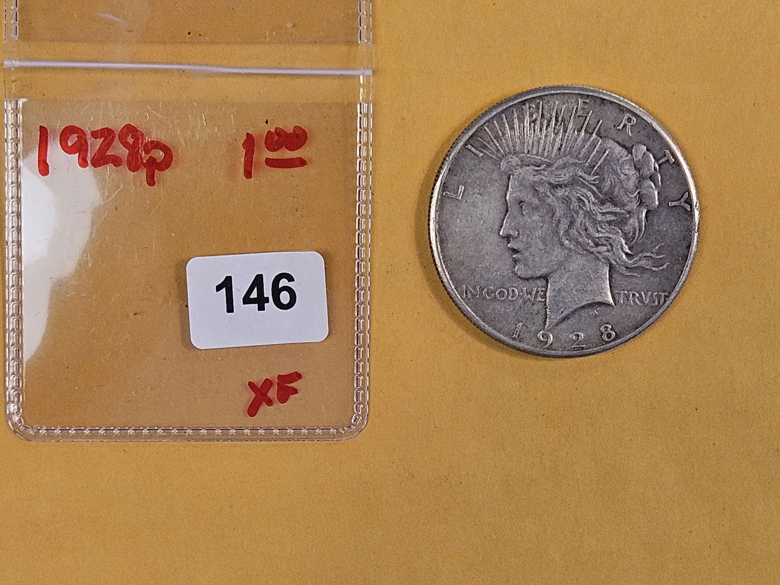 ** KEY DATE ** 1928 Peace silver Dollar in Extra Fine - 2