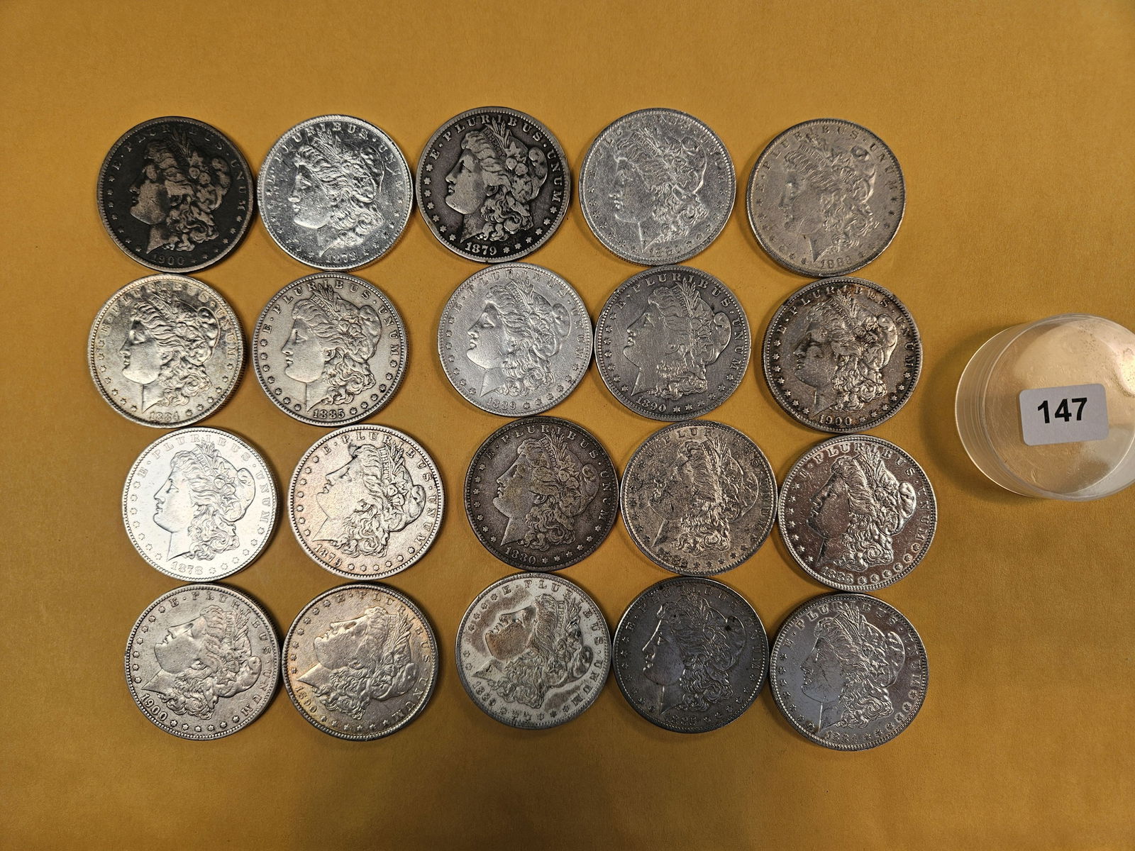 ** FULL ROLL ** Twenty Morgan Silver Dollars: All pre-1904. Grades from circulated to Brilliant Uncirculated - details 