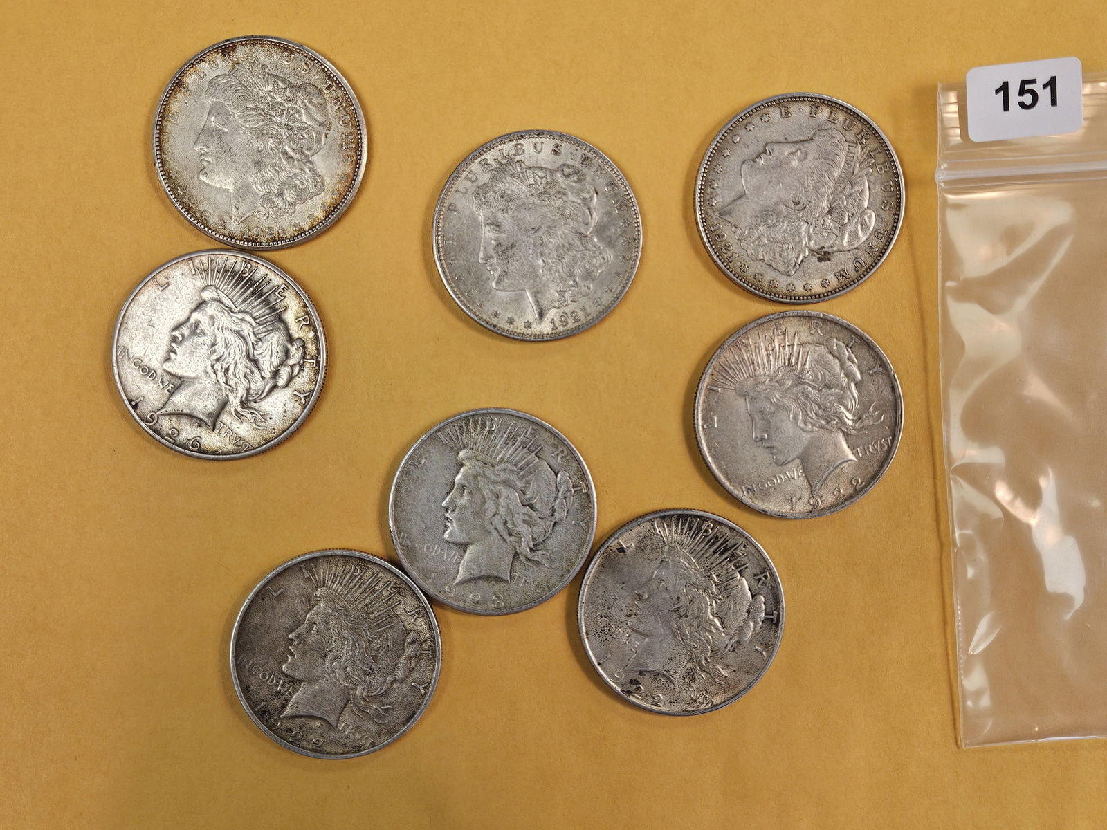 Eight mixed Morgan and Peace silver Dollars: Circulated 