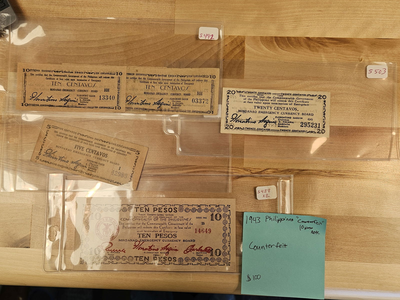 Six mixed Philippines notes: One says counterfeit…not sure if that's a modern or comtemporary or what 