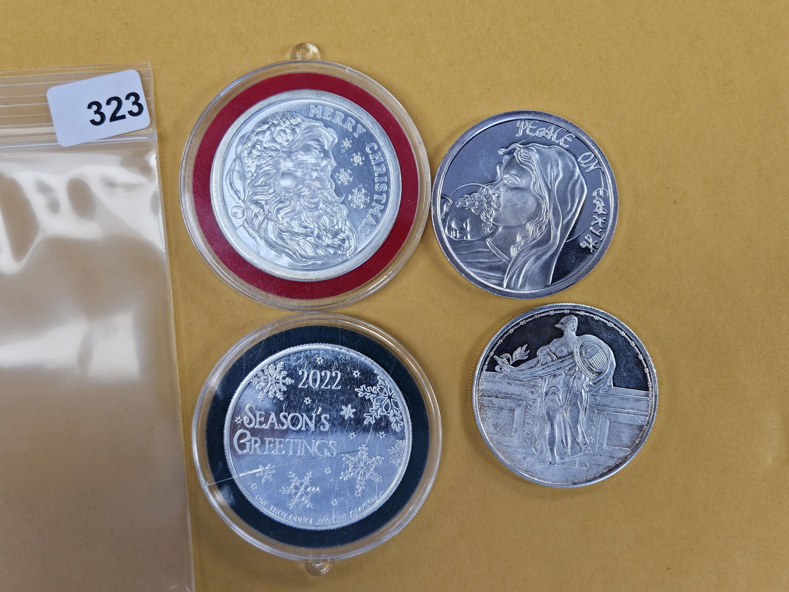Four 1-troy ounce .999 fine silver art pieces: Mixed. 